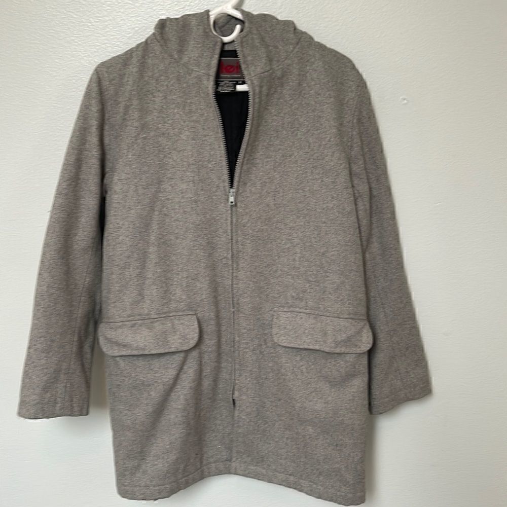 L.E.I. Wool zip up 3/4 length coat.  Quilted interior.  Size M.